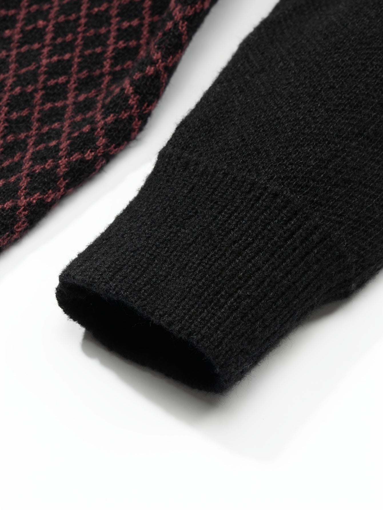 Maglione lavorato a maglia con motivo a rombi