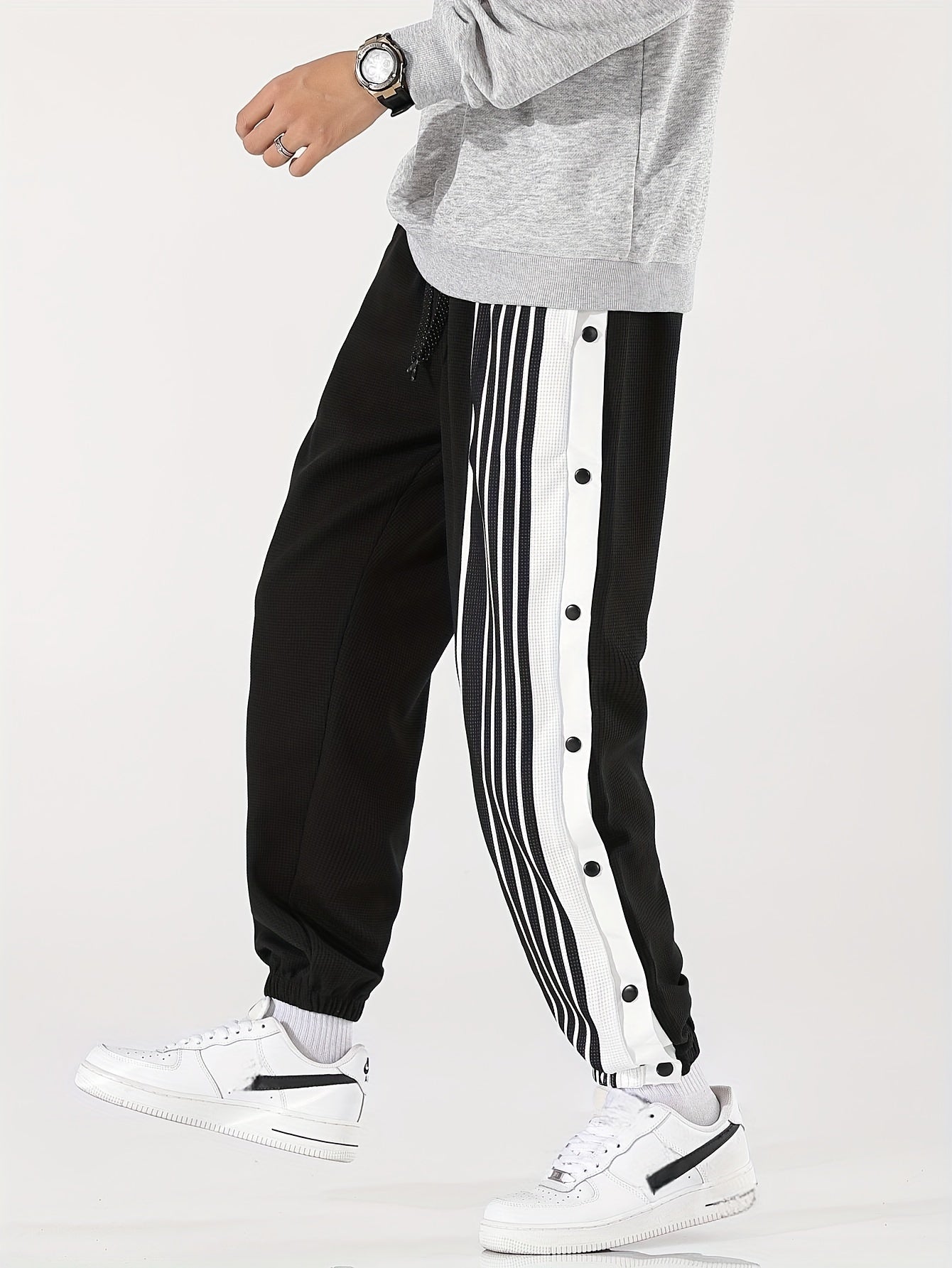 Pantaloni sportivi a righe da uomo