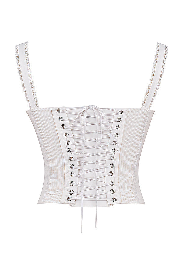 Corsetto in pizzo bianco sul retro